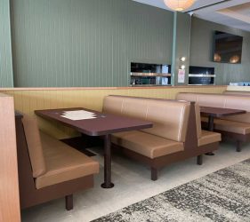 Dining Area – Spacious dining area with wooden chairs and pendant lighting.