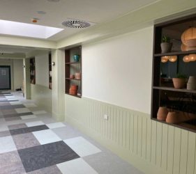 Kitchen Pass – Freshly painted kitchen pass-through with sleek finishes.