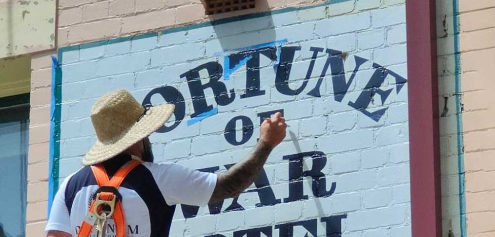 Hand-Painted Signage – Expert craftsmanship in heritage lettering.
