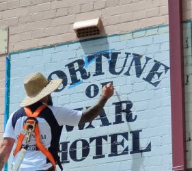 Hand-Painted Signage – Expert craftsmanship in heritage lettering.