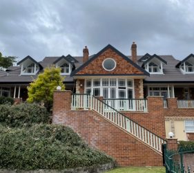 Grand Entrance Repaint – Full exterior transformation of a luxury home.