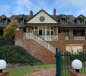 Grand Entrance Repaint – Full exterior transformation of a luxury home.
