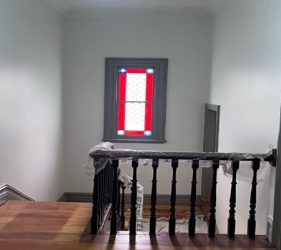 Restored and freshly painted hallway in heritage Dulwich Hill home with polished timber floors