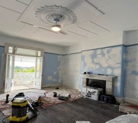 Living room prepared for professional painting and full restoration in Dulwich Hill