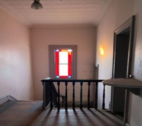 Stairwell before expert restoration and repainting