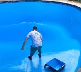 Epoxy pool painting Sydney – Platinum Painting team applying durable epoxy coating to swimming pool