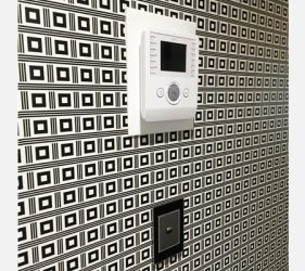 Grid wallpaper pattern close-up with wall console in Vaucluse