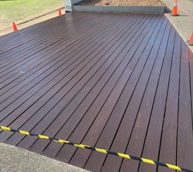 Completed decking restoration at Rose Bay War Memorial with fresh staining