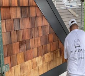Staining timber shingles in Belrose using Cutek Extreme CD50 oil.
