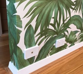 Close-up of green tropical leaf wallpaper in Mosman