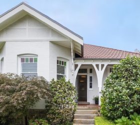 Freshly painted federation-style home in Mosman with crisp white exterior and well-maintained garden
