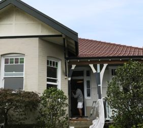 Federation-style home in Mosman with fresh paint samples applied to exterior for colour testing