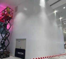 Night shift painting using scissor lift at Sydney Airport