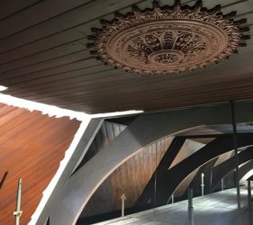 Dark stained church ceiling in Surry Hills prior to stain-blocker application and repaint